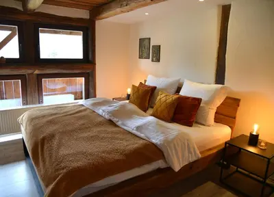 Ein Bett oder Betten in einem Zimmer der Unterkunft Ferienhaus mit 2 Schlafzimmern in Grimma nahe Mulderadweg