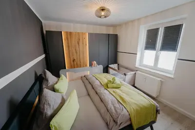 Ein Bett oder Betten in einem Zimmer der Unterkunft Auszeit Domizile