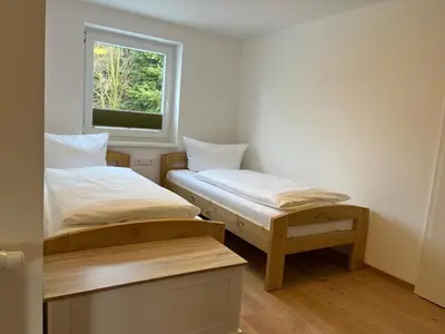 Ein Bett oder Betten in einem Zimmer der Unterkunft 4-Steine-Blick, Wohnung 2