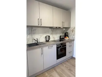 Küche/Küchenzeile in der Unterkunft Moderne Ferienwohnung in Elstra