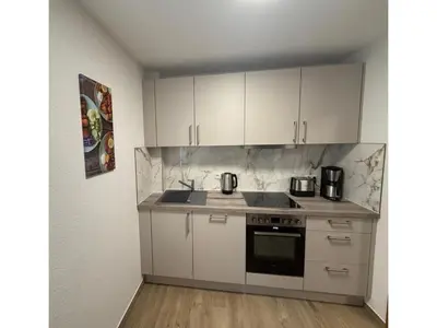 Küche/Küchenzeile in der Unterkunft Moderne Ferienwohnung in Elstra