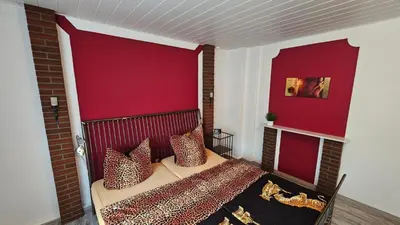 Ein Bett oder Betten in einem Zimmer der Unterkunft Ferienwohnung Stephan