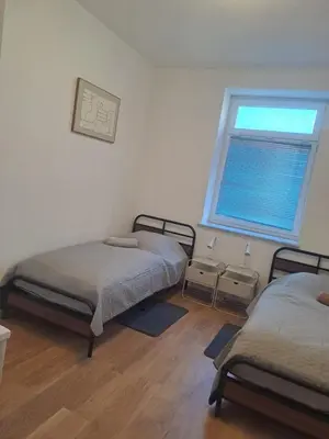 Ein Bett oder Betten in einem Zimmer der Unterkunft Gemütliche 4-Zimmer Wohnung mit 7 Schlafplätzen