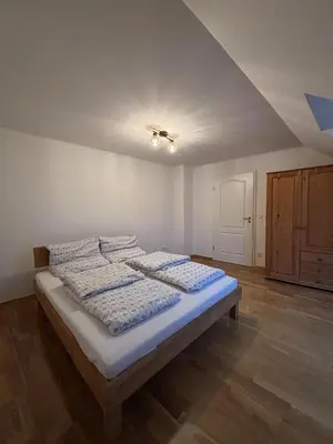 Ein Bett oder Betten in einem Zimmer der Unterkunft Moderne 4-Zimmer Wohnung mit Balkon