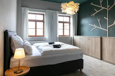 Ein Bett oder Betten in einem Zimmer der Unterkunft Wohnen mitten in der Altstadt von Freiberg