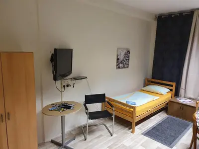 Ein Bett oder Betten in einem Zimmer der Unterkunft Monteurzimmer Siebenlehn