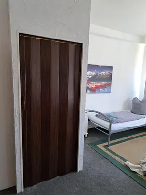 Ein Bett oder Betten in einem Zimmer der Unterkunft Monteurzimmer Siebenlehn
