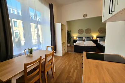 Ein Bett oder Betten in einem Zimmer der Unterkunft LUMA Apartments