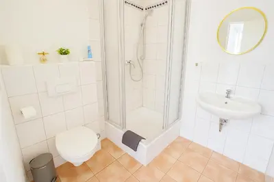 Ein Badezimmer in der Unterkunft LUMA Apartments