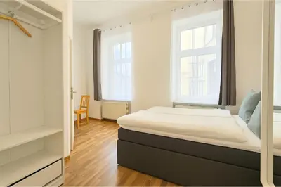 Ein Bett oder Betten in einem Zimmer der Unterkunft LUMA Apartments