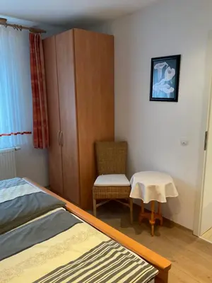 Ein Bett oder Betten in einem Zimmer der Unterkunft Ferienwohnung Mitko