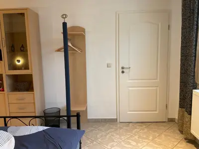 Ein Bett oder Betten in einem Zimmer der Unterkunft Ferienwohnung Mitko