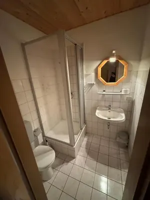 Ein Badezimmer in der Unterkunft Gästehaus Trompeter