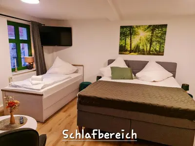 Ein Bett oder Betten in einem Zimmer der Unterkunft Apartment Marktplatz