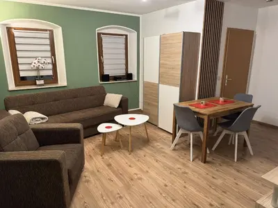 Ein Sitzbereich in der Unterkunft Apartment Wuff Altendorf