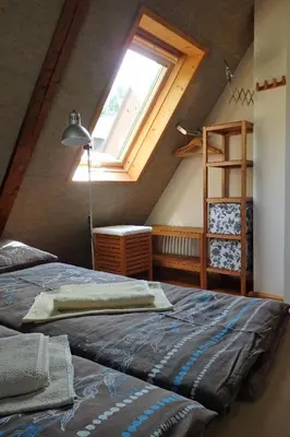 Ein Bett oder Betten in einem Zimmer der Unterkunft Ferienhaus Altes Elbschifferhaus