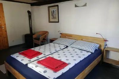 Ein Bett oder Betten in einem Zimmer der Unterkunft Ferienhaus Altes Elbschifferhaus