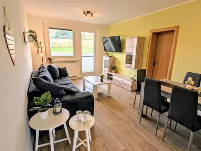 Ein Sitzbereich in der Unterkunft Ferienwohnung August 29
