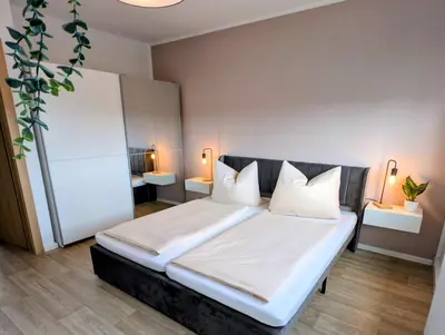 Ein Bett oder Betten in einem Zimmer der Unterkunft Ferienwohnung August 29