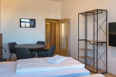 Ein Bett oder Betten in einem Zimmer der Unterkunft Homely Apartments Burgblick Parkplatz Wlan Küche Zentral