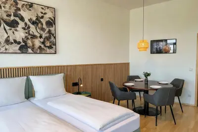 Ein Bett oder Betten in einem Zimmer der Unterkunft Homely Apartments Burgblick Parkplatz Wlan Küche Zentral