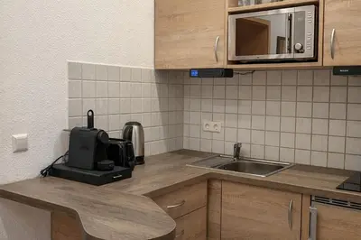 Küche/Küchenzeile in der Unterkunft Homely Apartments Burgblick Parkplatz Wlan Küche Zentral