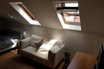 Ein Bett oder Betten in einem Zimmer der Unterkunft Elegante Altbauwohnung zentral & voll ausgestattet