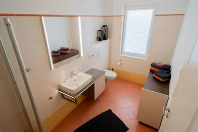 Ein Badezimmer in der Unterkunft SILBERhERZ