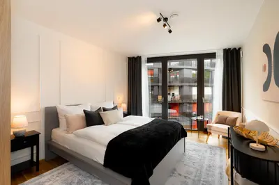 Ein Bett oder Betten in einem Zimmer der Unterkunft Design Apartment Elbblick Küche Parken Wlan