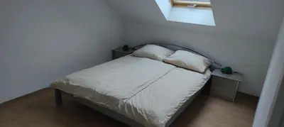 Ein Bett oder Betten in einem Zimmer der Unterkunft Grüne Auszeit Dresden