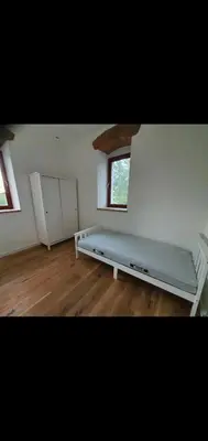 Ein Bett oder Betten in einem Zimmer der Unterkunft Fewo EG
