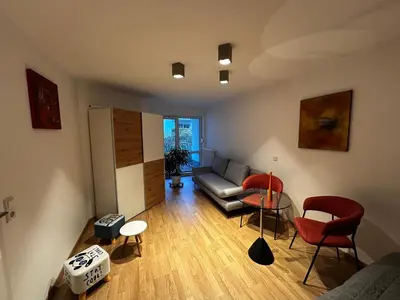 Ein Sitzbereich in der Unterkunft Enjoy Rooms