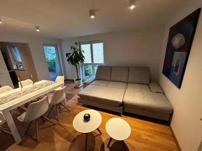 Ein Sitzbereich in der Unterkunft Enjoy Rooms