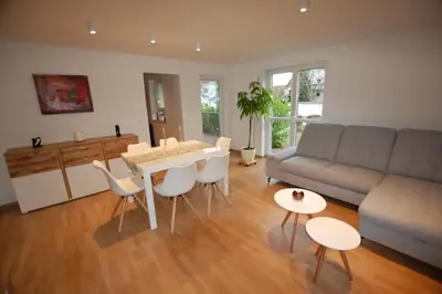 Ein Sitzbereich in der Unterkunft Enjoy Rooms
