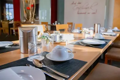 Ein Restaurant oder anderes Speiselokal in der Unterkunft ApartHotel 