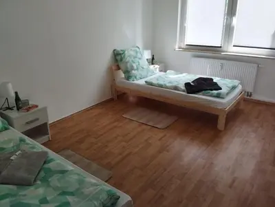 Ein Bett oder Betten in einem Zimmer der Unterkunft Monteurunterkunft, Gunstig Unterkunft