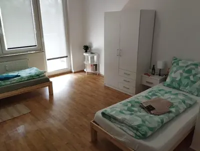 Ein Bett oder Betten in einem Zimmer der Unterkunft Monteurunterkunft, Gunstig Unterkunft