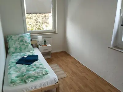 Ein Bett oder Betten in einem Zimmer der Unterkunft Monteurunterkunft, Gunstig Unterkunft