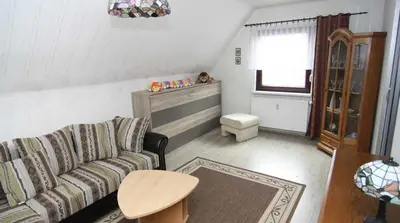 Ein Sitzbereich in der Unterkunft Ferienwohnung Kresse