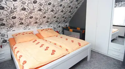 Ein Bett oder Betten in einem Zimmer der Unterkunft Ferienwohnung Kresse