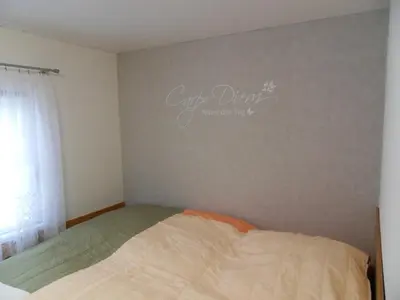 Ein Bett oder Betten in einem Zimmer der Unterkunft Kriebstein-Oase