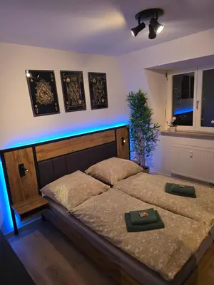 Ein Bett oder Betten in einem Zimmer der Unterkunft WohnTraum Im Grünen, Balkon