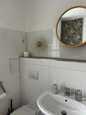 Ein Badezimmer in der Unterkunft Wohnen im Musikerviertel-Apartment Sun -