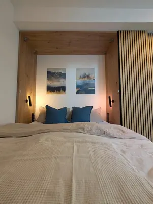 Ein Bett oder Betten in einem Zimmer der Unterkunft Modernes Studio in Elbnähe - auf Wunsch mit Auto
