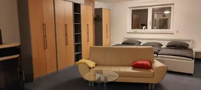 Ein Sitzbereich in der Unterkunft Family Room Grüne Auszeit Dresden