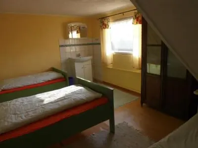 Ein Bett oder Betten in einem Zimmer der Unterkunft Haus Friedland