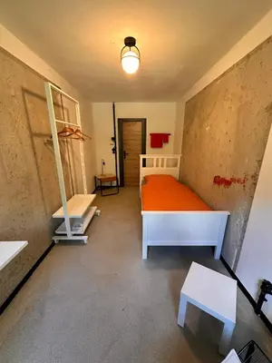 Ein Bett oder Betten in einem Zimmer der Unterkunft carotel -zum bunten Hund- apartment complete