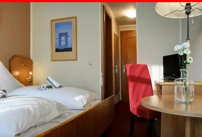 Ein Bett oder Betten in einem Zimmer der Unterkunft Elbterrasse Wachwitz