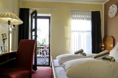 Ein Bett oder Betten in einem Zimmer der Unterkunft Elbterrasse Wachwitz