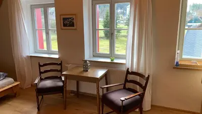 Ein Sitzbereich in der Unterkunft Haus Waldeck